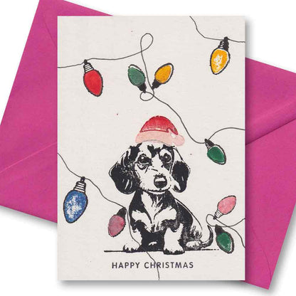 Handgedruckte Postkarte I Weihnachtsdackel mit Lichterkette